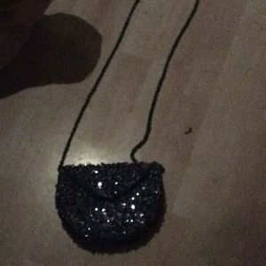 This is a cute sparkling purse